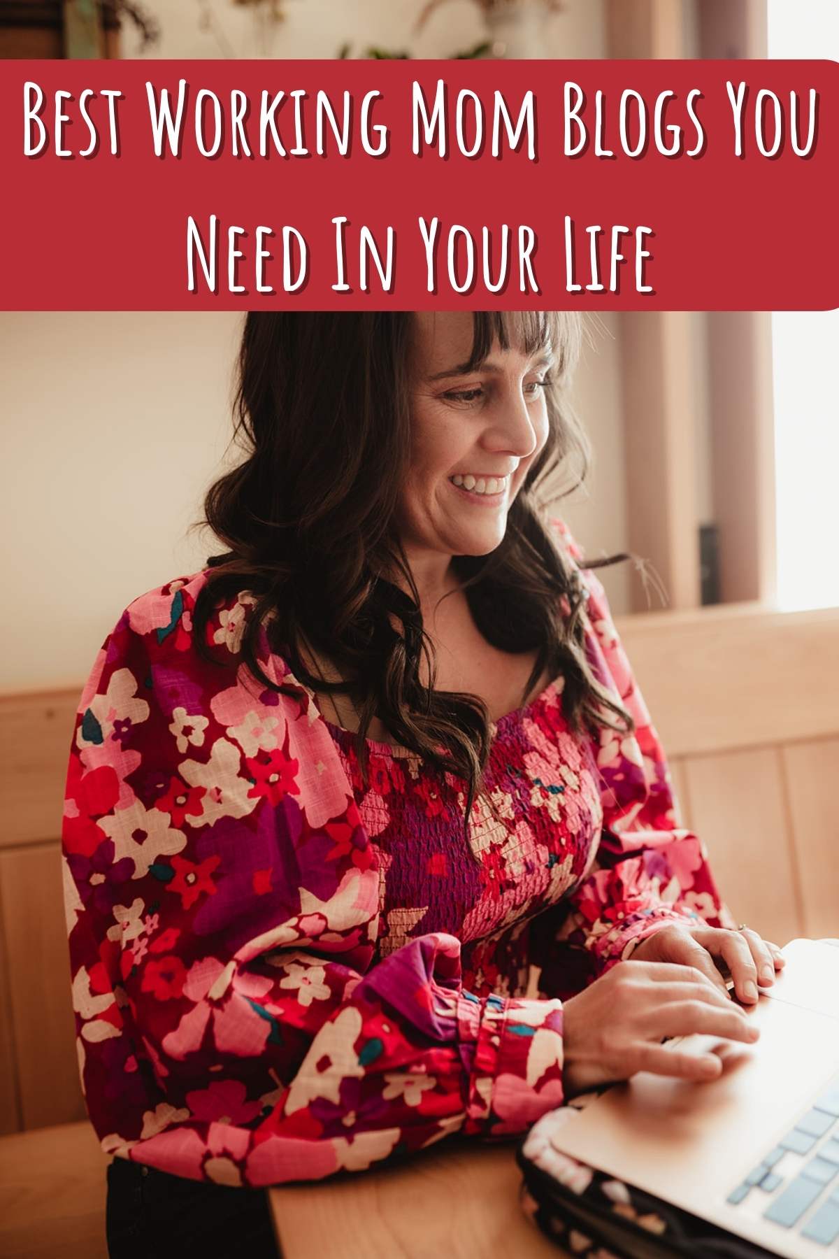 Best working mom blogs you need in your life. Photo of woman smiling at computer.