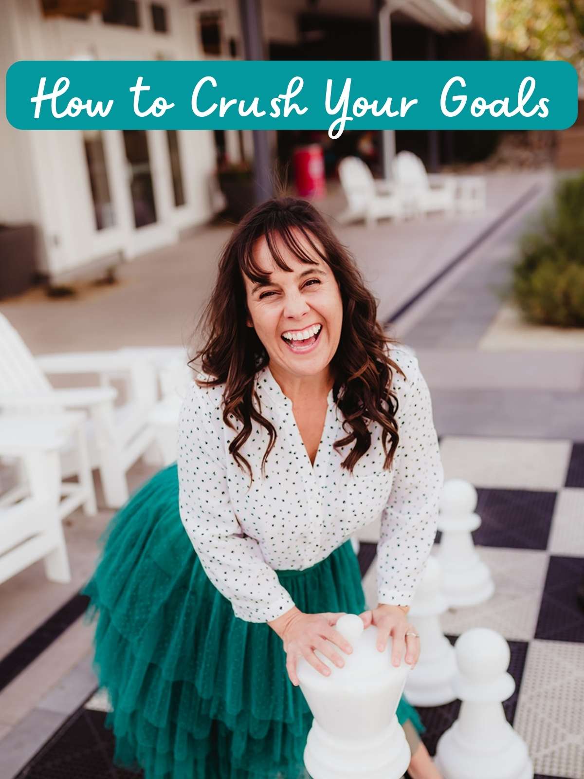 How to Crush Your goals. Photo of woman with large chess table
