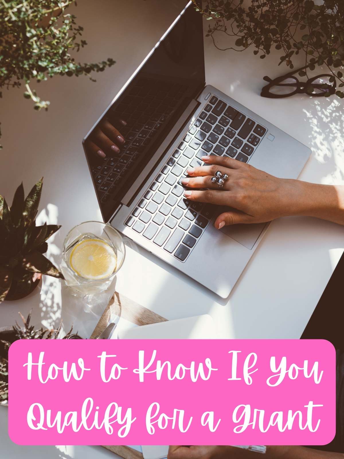 How to know if you qualify for a grant. Photo of person in front of computer.